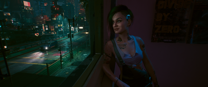 Judy Alvarez in Cyberpunk 2077 overlooking a city street
