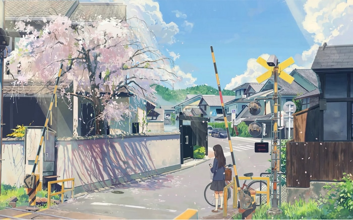 Girl with bicycle at a Japanese railroad crossing with cherry blossoms