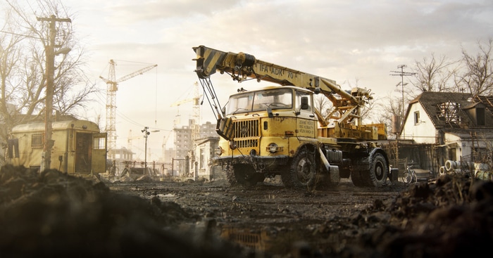 Yellow IFA ADR 70 Crane Truck in Muddy Construction Site