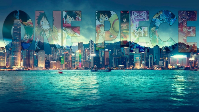 One Piece characters superimposed on Hong Kong skyline at night