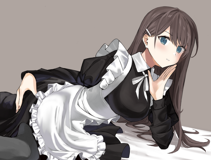 Maid outfit girl lying down