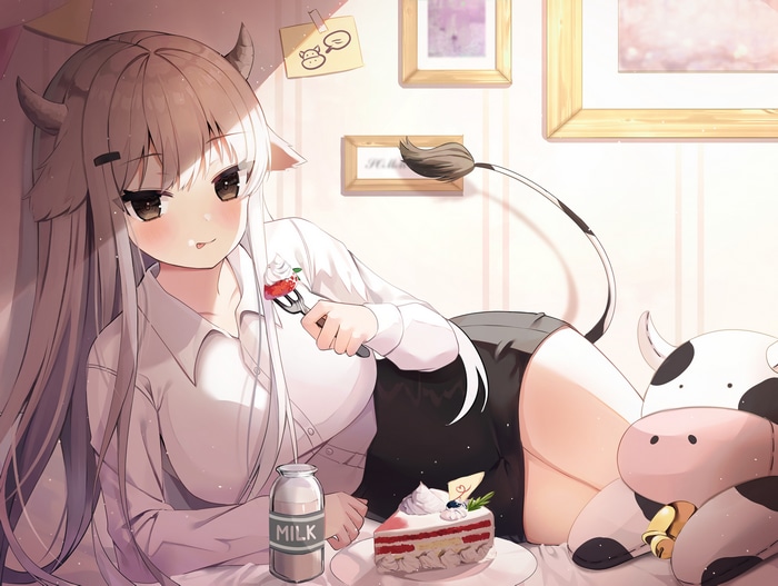 Anime girl with cow ears eating cake