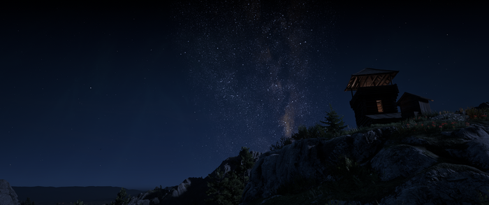 Red Dead Redemption 2 night sky with stars and cabin