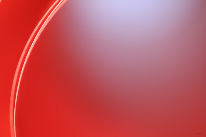 Abstract red and purple gradient with curved lines