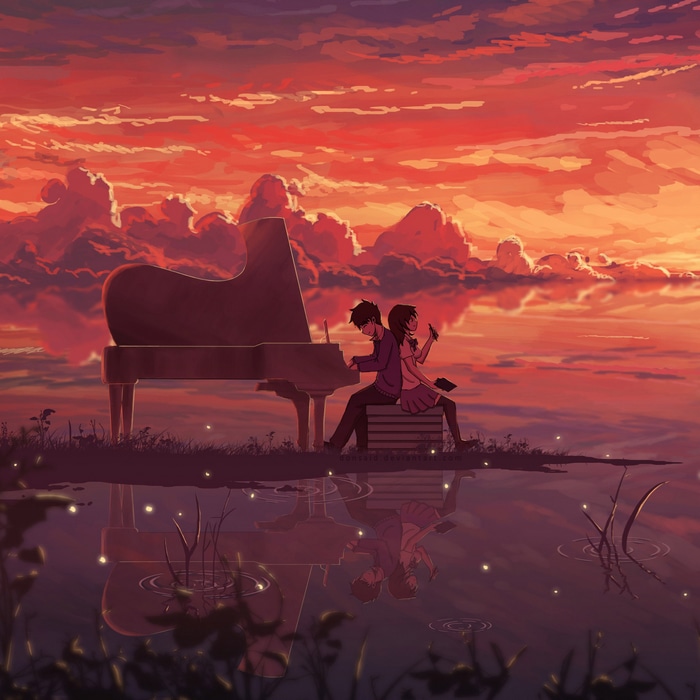 Couple playing piano at sunset with reflection