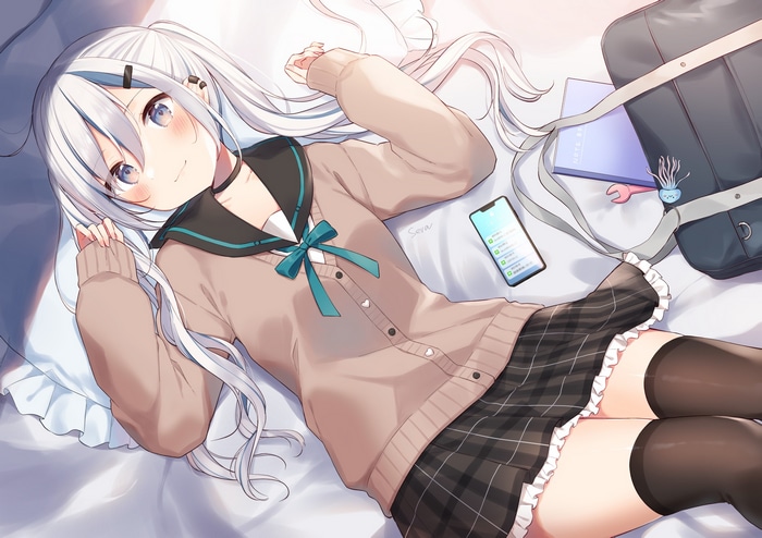 Anime girl with white hair lying on a bed