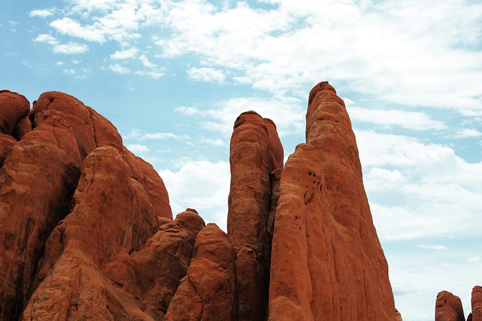Arches National Park rock formations under a cloudy sky