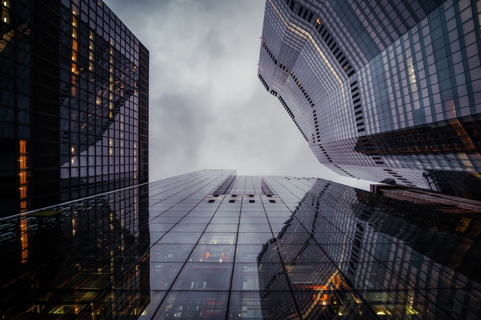 Modern skyscrapers against a cloudy sky