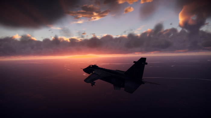 SEPECAT Jaguar jet fighter flying at sunset