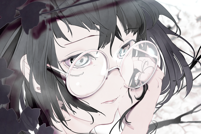 Woman with glasses looking through branches