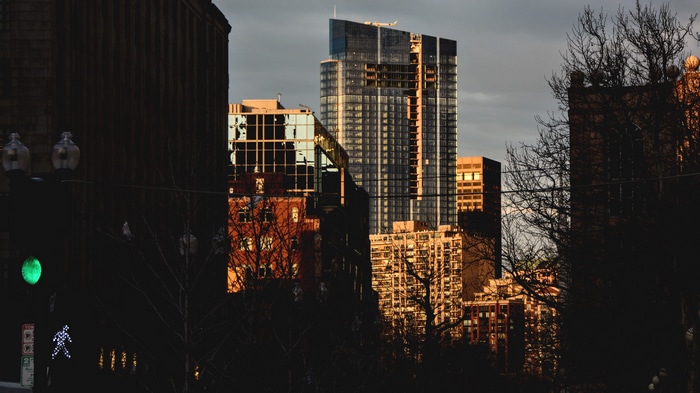 Boston cityscape at sunset with skyscrapers