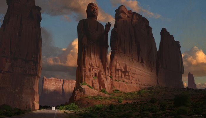 Giant Buddha statue carved into a sandstone cliff face