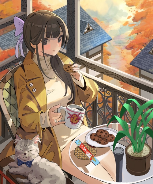 Girl with cat and cookies on balcony