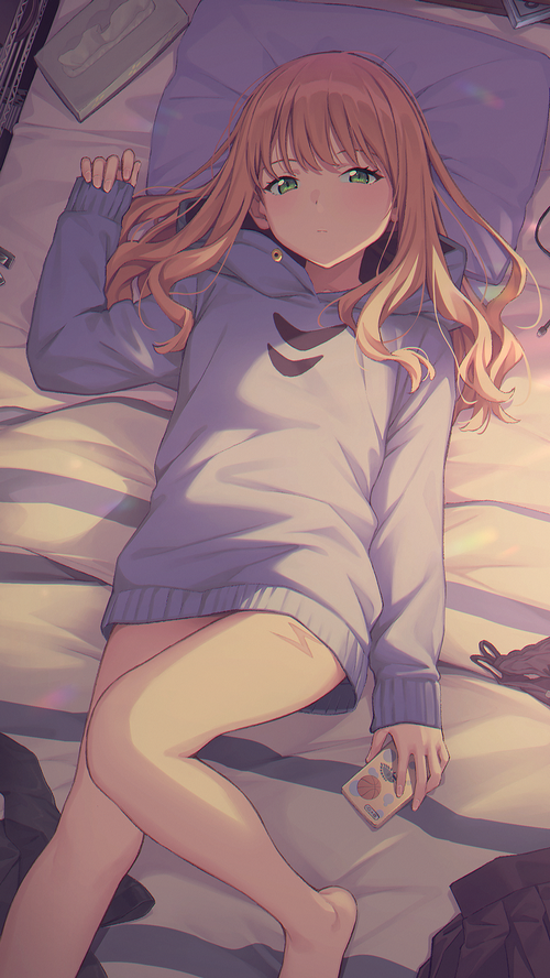Minami Yume in a Hoodie Lying on a Bed