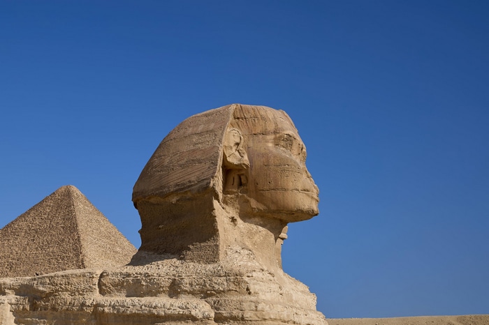 The Great Sphinx of Giza and a Pyramid