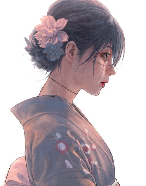 Woman with flowers in her hair wearing a kimono