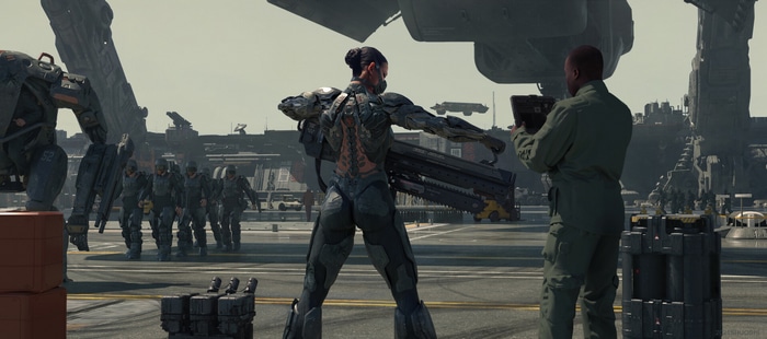 Female warrior with heavy weapon on military base