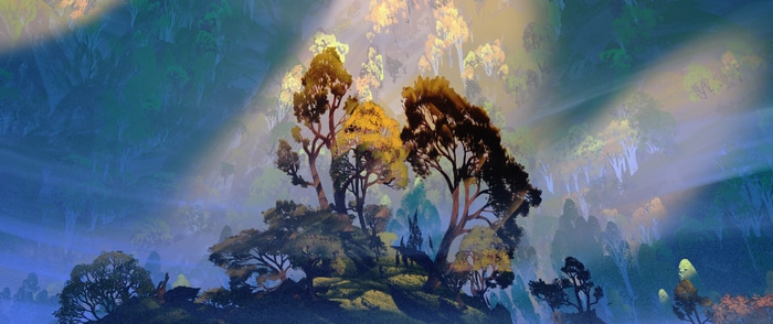 Misty forest with sunbeams filtering through trees