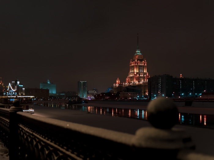Moscow cityscape at night with illuminated buildings
