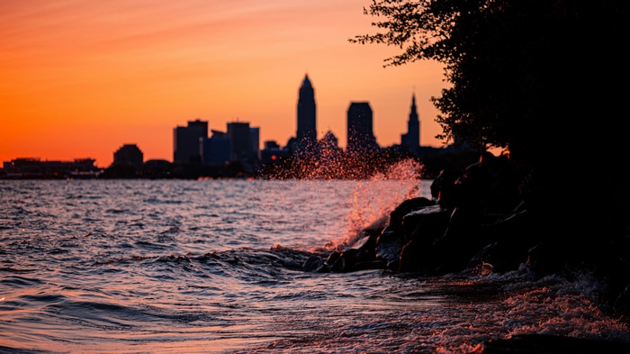 Cleveland skyline at dusk over Lake Erie