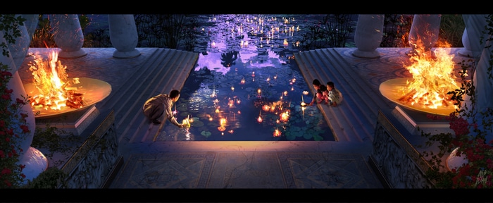 Children release lanterns on a pond near bonfires