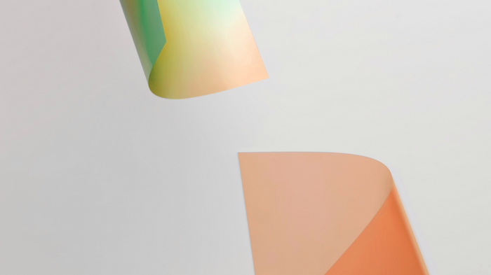Abstract shapes with gradient colors on a light background