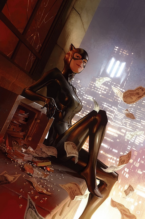 Catwoman sitting on a ledge with money and gold