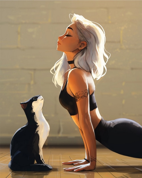 Woman doing yoga with a cat