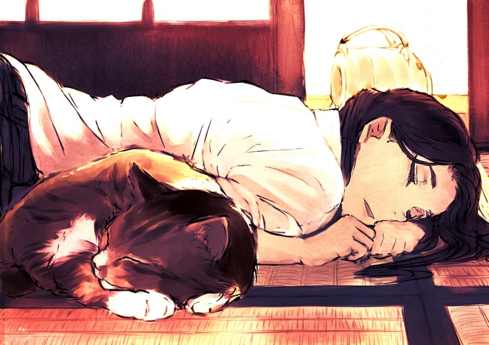 A person and a cat sleeping