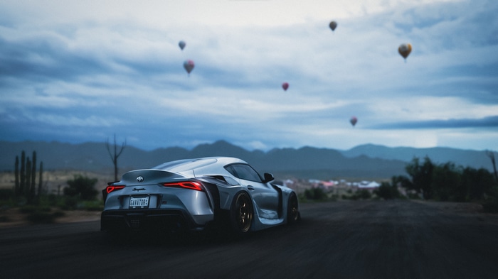 Silver Toyota Supra in Forza Horizon 5 with Hot Air Balloons