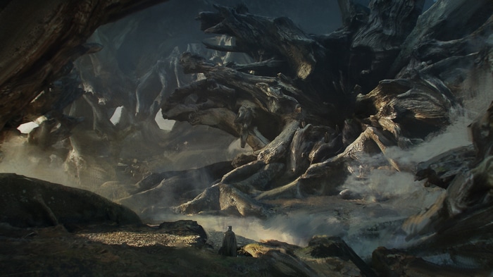 Fantasy art of a dark, cavernous landscape