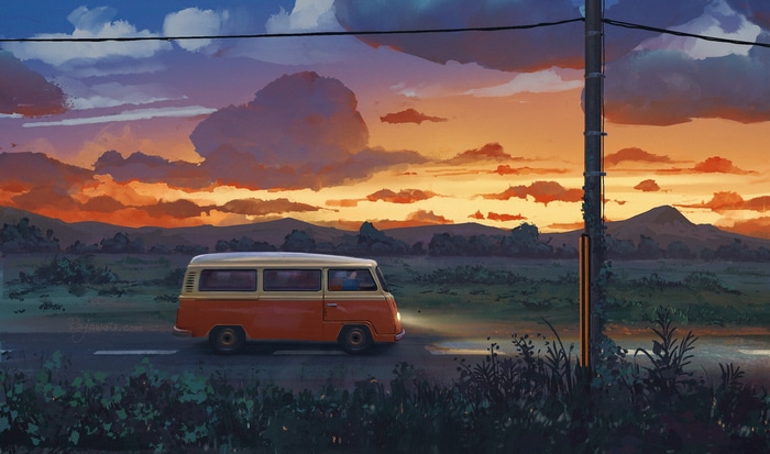 Orange van driving on a road at sunset