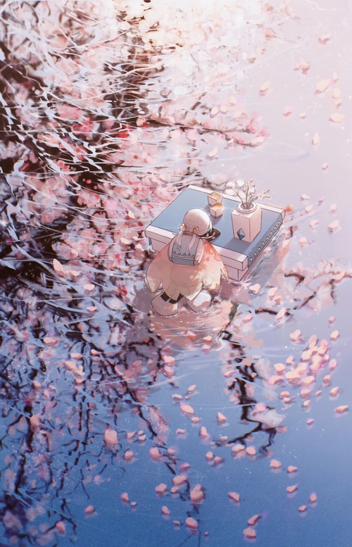 Girl sitting by a table in cherry blossom water