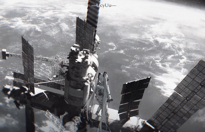 Hatsune Miku in an astronaut suit on a space station
