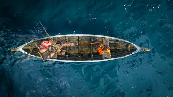 God of War: Kratos and Atreus in a boat