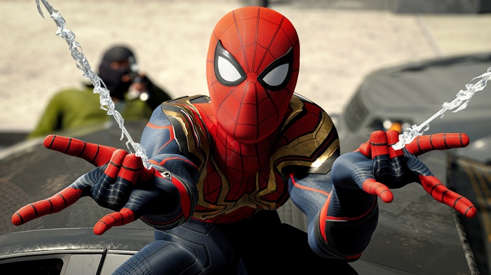 Spider-Man in his Iron Spider suit shooting webs