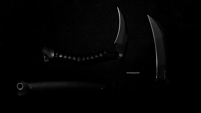 Monochrome image of two karambits and a pistol