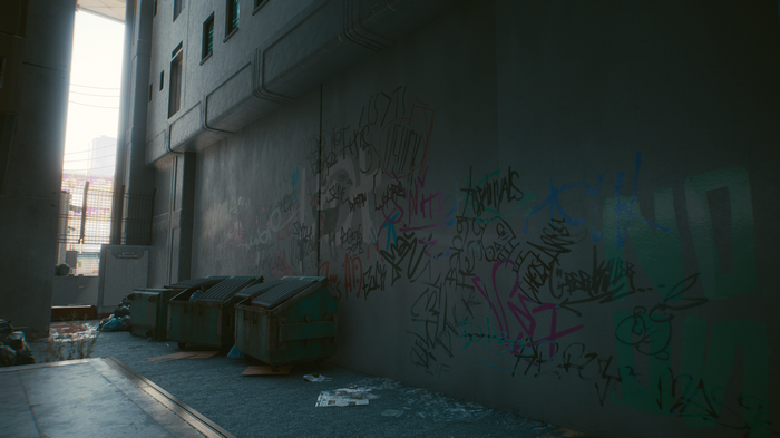 Cyberpunk 2077 alley with graffiti and dumpsters