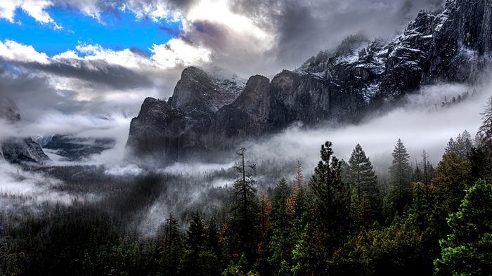 4K Yosemite Valley mountains with fog and trees