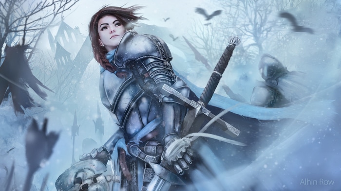 Fantasy girl in armor with swords in a snowy landscape