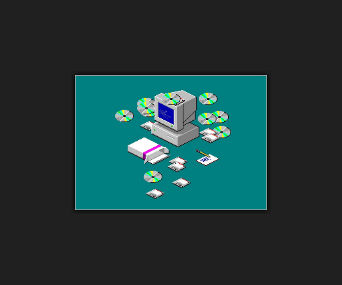 Retro computer with CDs and floppy disks
