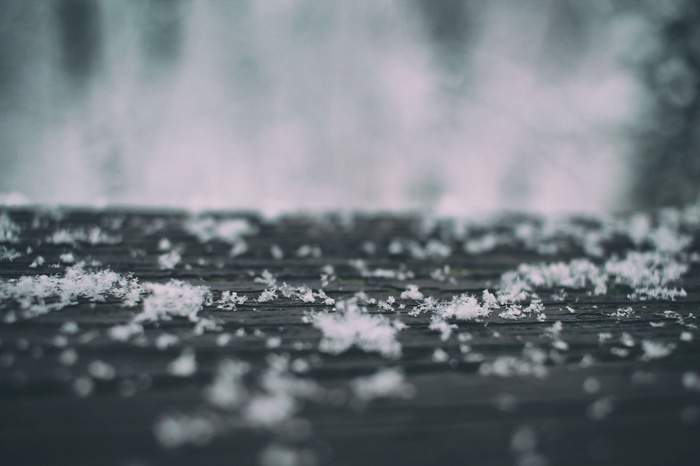 4K Macro Snow on Wood Surface in Winter