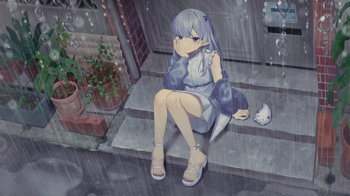 Girl with pointy ears sitting in the rain