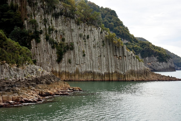 Basalt columns on a rocky coastline by the sea