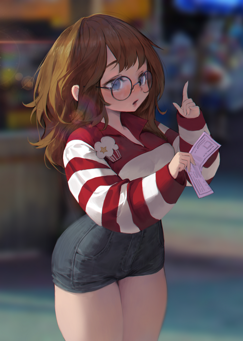 Girl with glasses holding paper