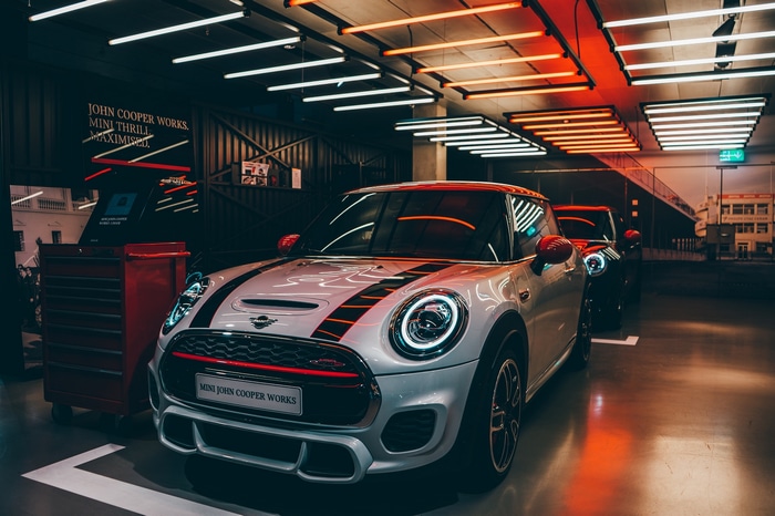 White Mini John Cooper Works in a garage
