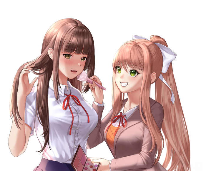 Monika applying makeup to a friend