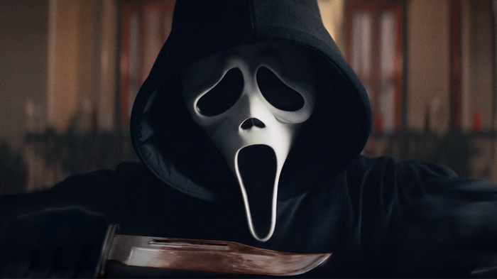 Ghostface from Scream holding a bloody knife