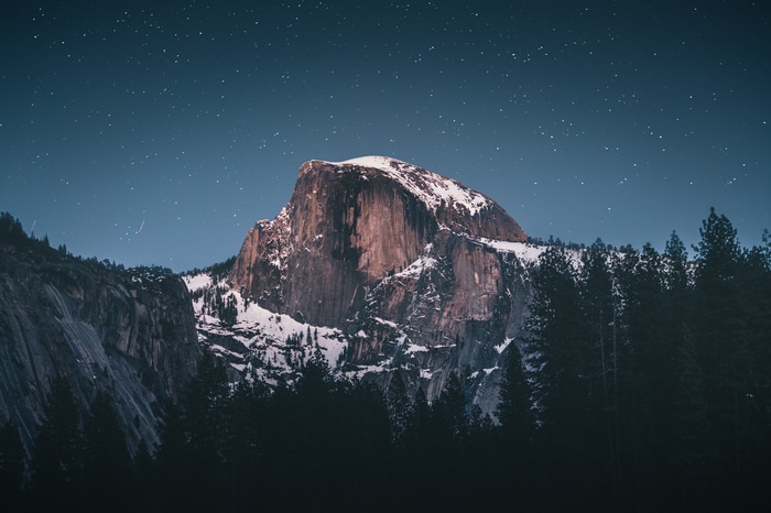 4K Half Dome mountain at night with stars