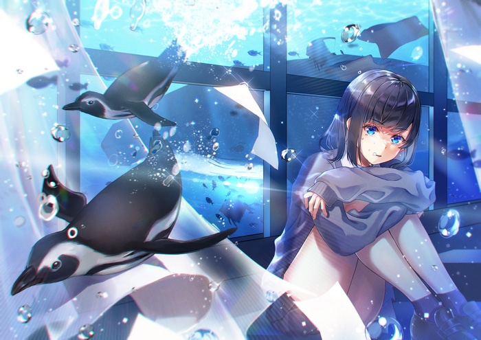 Girl and penguins in an aquarium